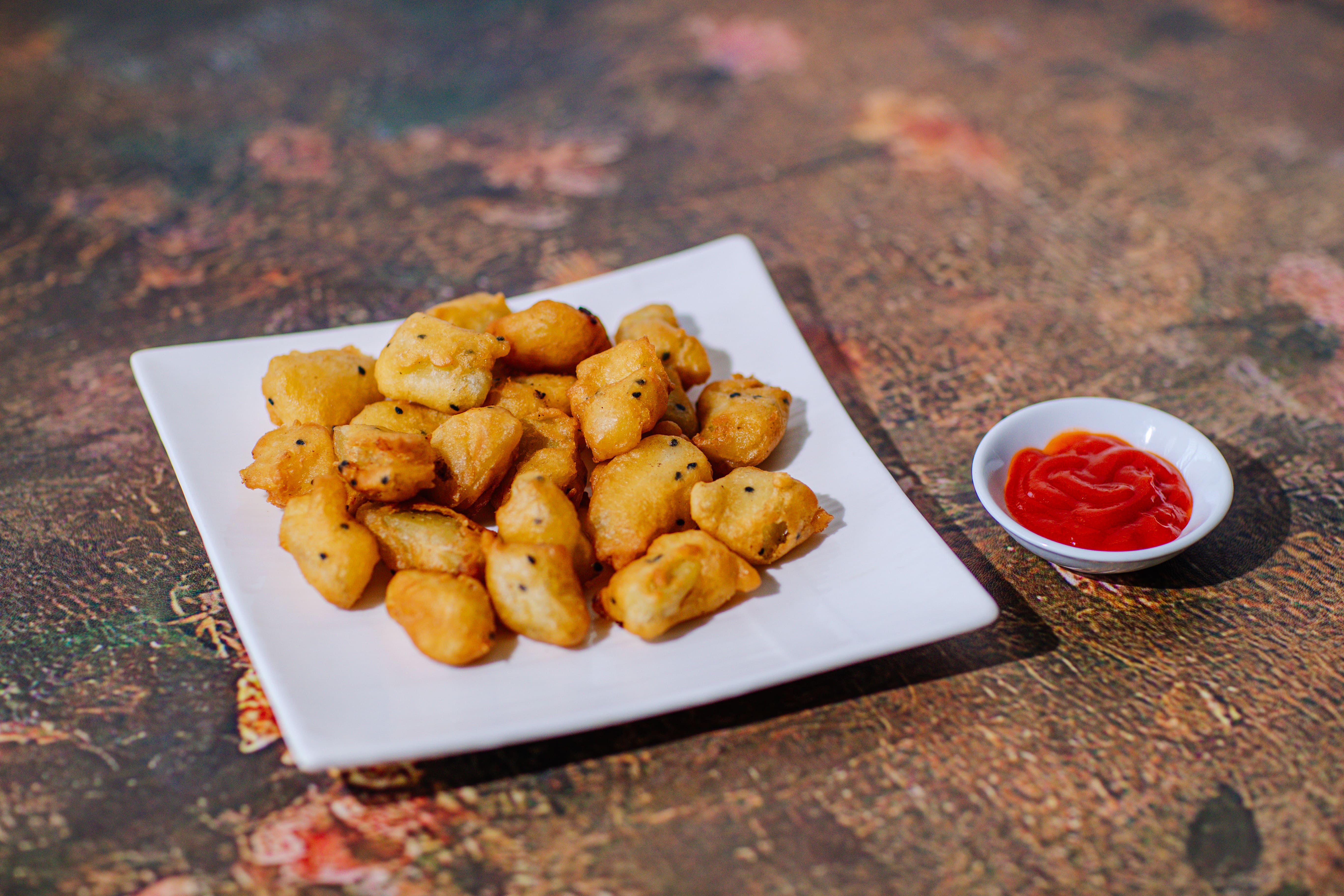 Khoai lang kén (fried sweet potatoes)